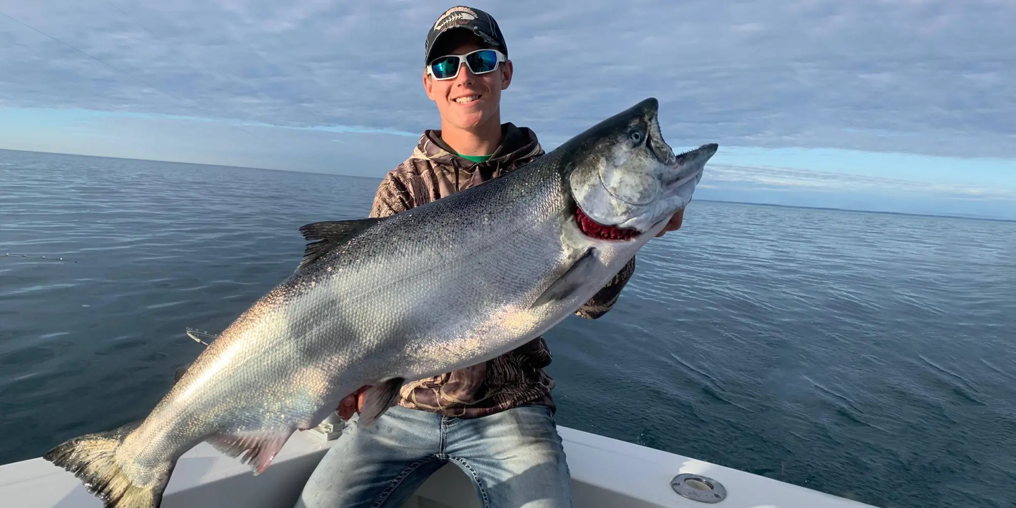 Charter Fishing Algoma WI Man With Salmon