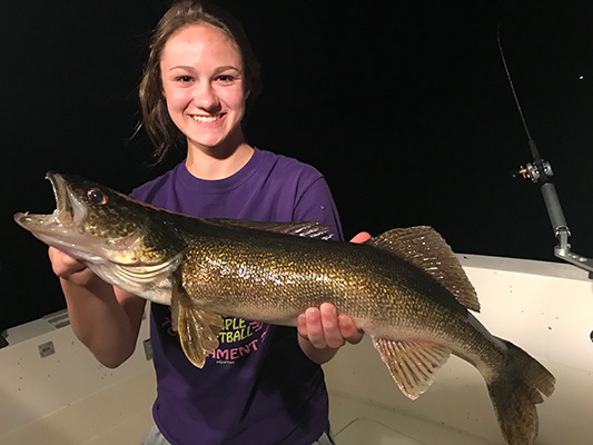 Charter Fishing Sturgeon Bay Young Woman Holding A Walleye